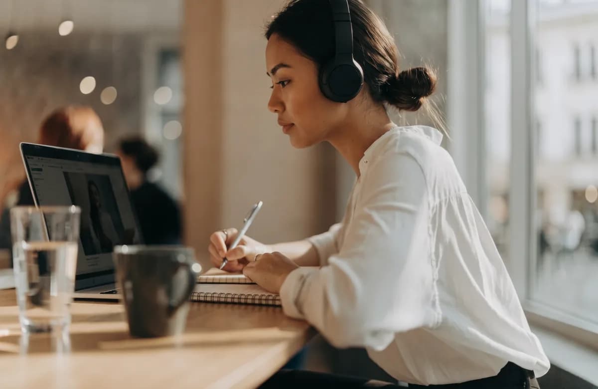 A woman taking an online course